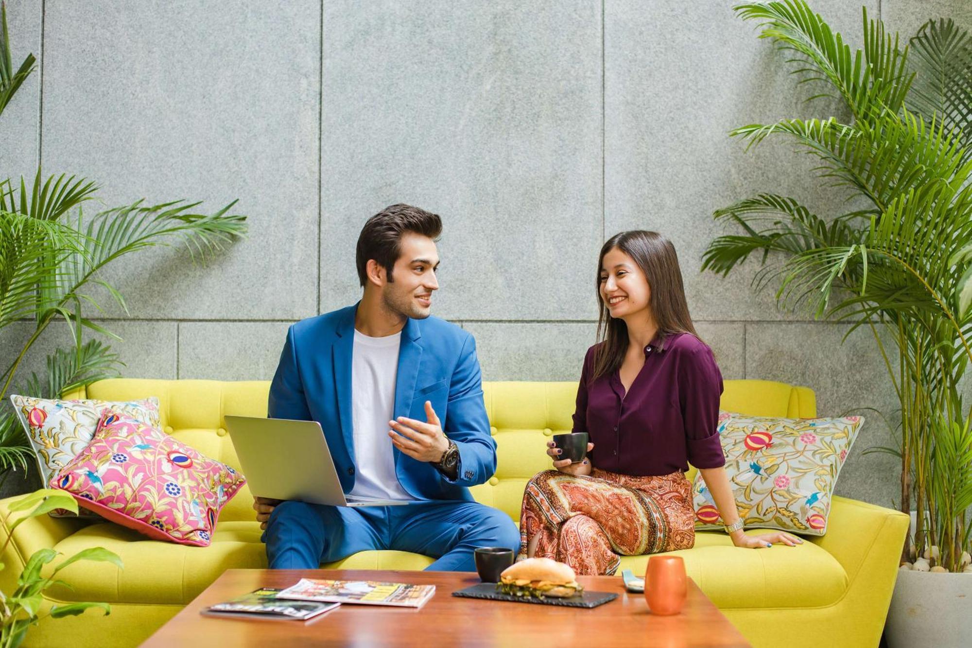 Hyatt Centric Mg Road Bangalore Exterior photo A couple at the lounge