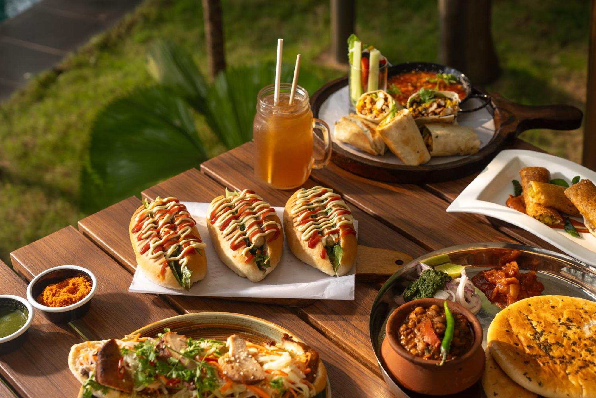 Hyatt Centric Mg Road Bangalore Exterior photo A selection of dishes at the restaurant